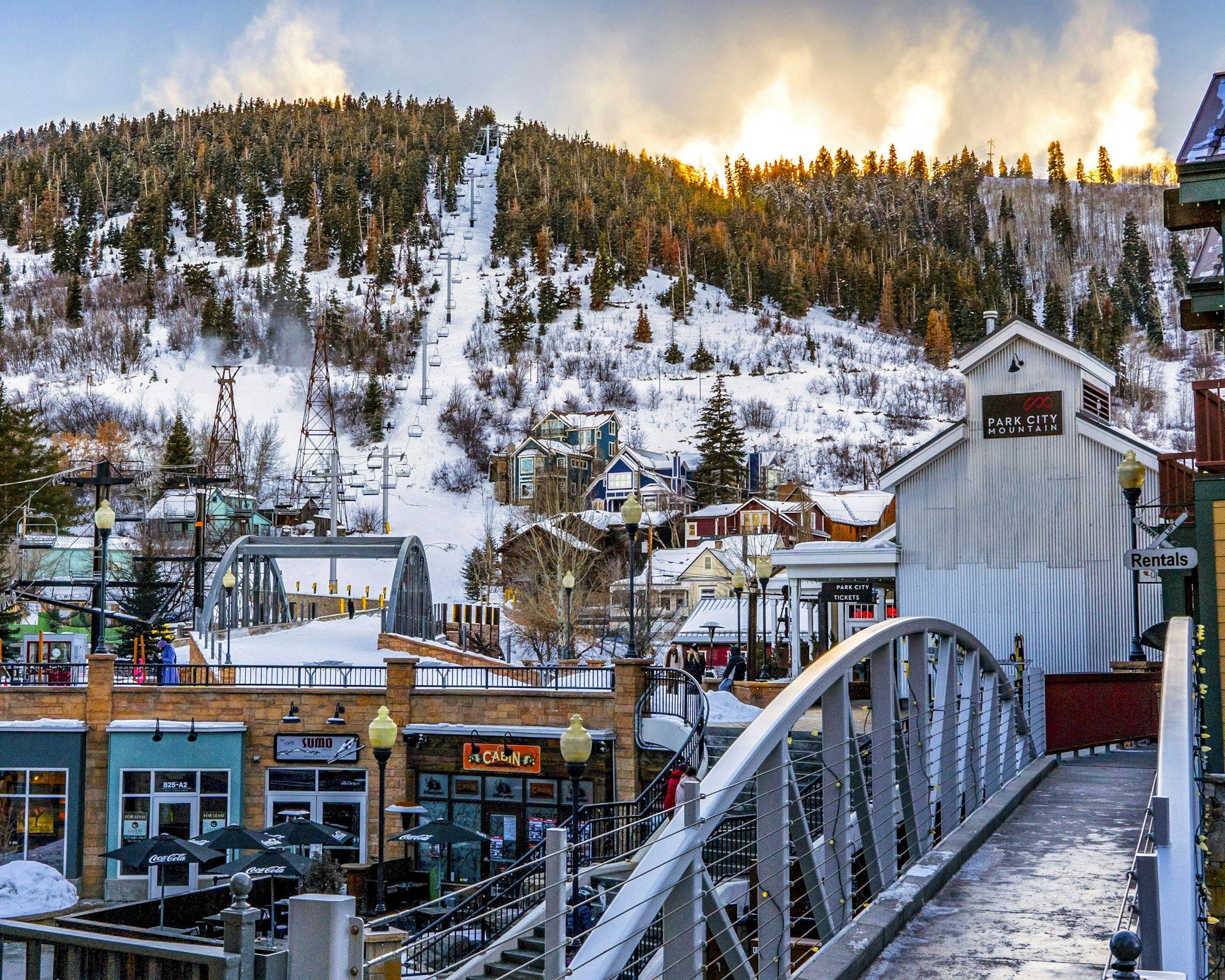 Wooden bridge over snow-covered Park City mountain in Summit County